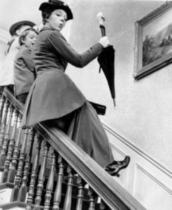 Mary Poppins sliding down the banister with the children full clothed and ready to go, first thing in the morning.